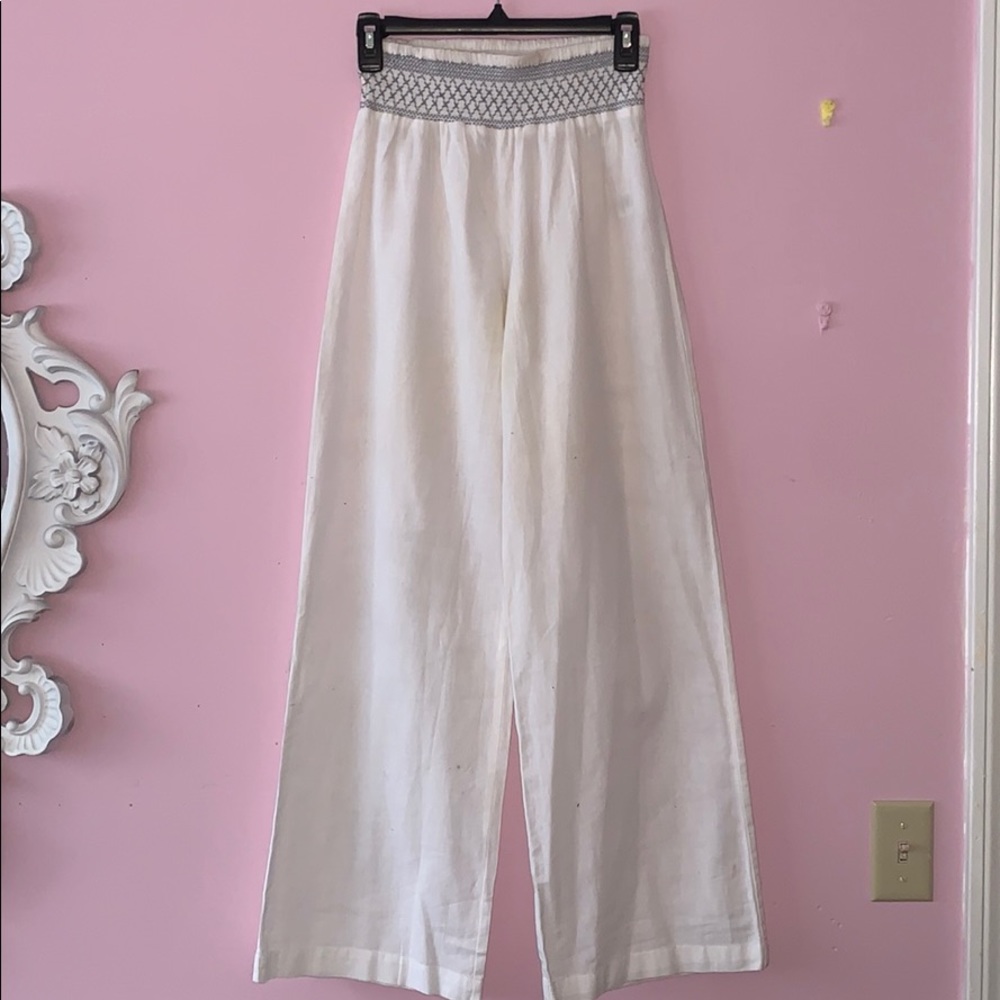 White flared pants